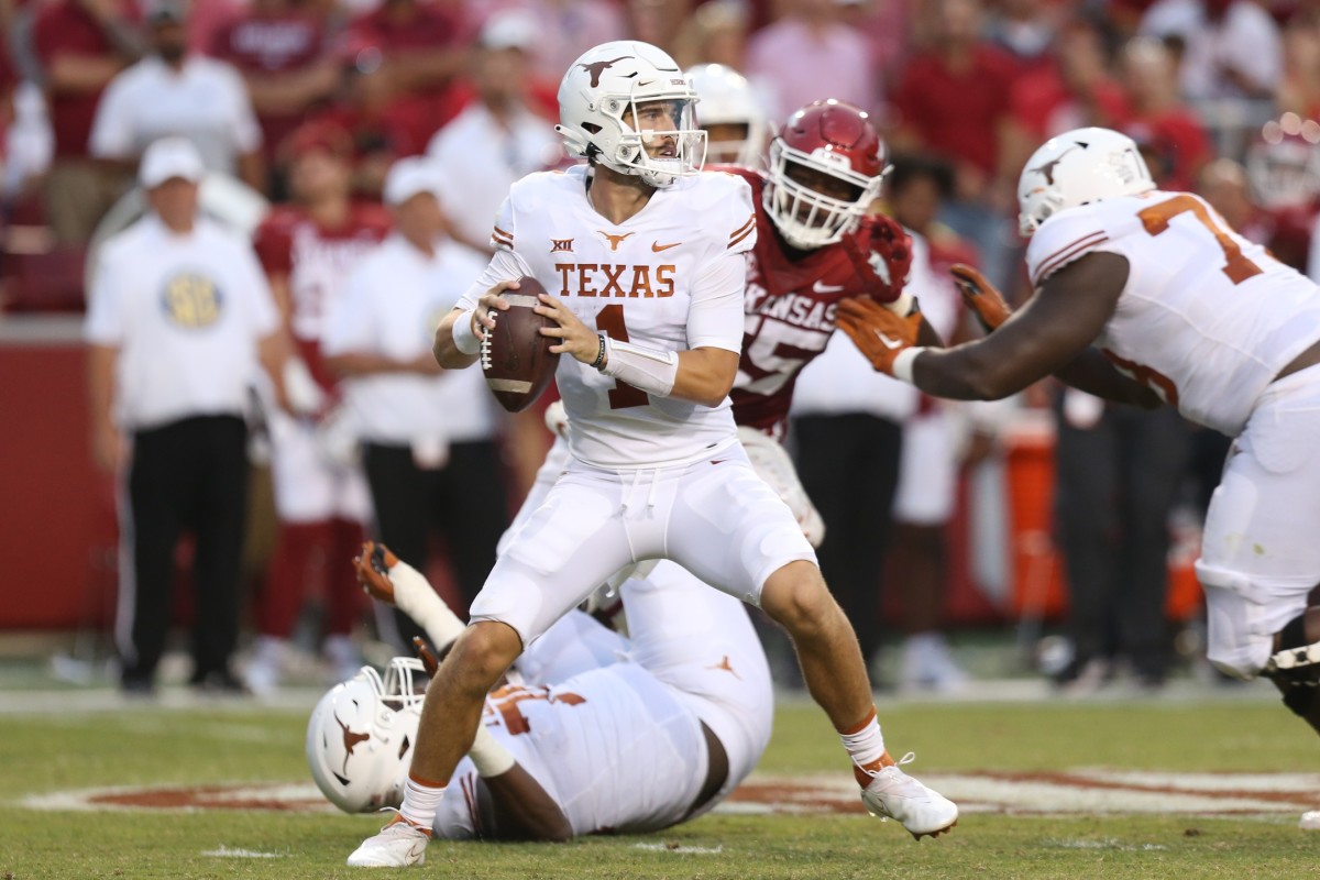 Sep 11, 2021; Fayetteville, Arkansas, USA; Texas Longhorns quarterback Hudson Card (1) looks to pass during the second quarter against the Arkansas Razorbacks at Donald W. Reynolds Razorback Stadium.